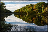 Clouds and trees reflected in East Branch Penobscot River. Katahdin Woods and Waters National Monument, Maine, USA ( color)