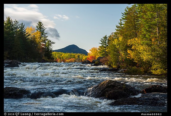 Haskell Rock Pitch cascades and Bald Mountain framed by trees in autumn foliage. Katahdin Woods and Waters National Monument, Maine, USA (color)