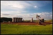 Oil pumpjack and tanks. North Dakota, USA (color)