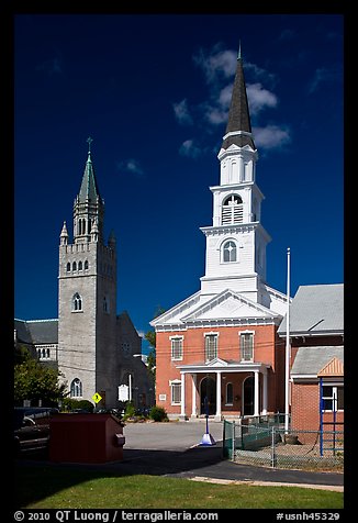 White steepled church and stone church. Concord, New Hampshire, USA