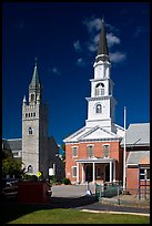 White steepled church and stone church. Concord, New Hampshire, USA