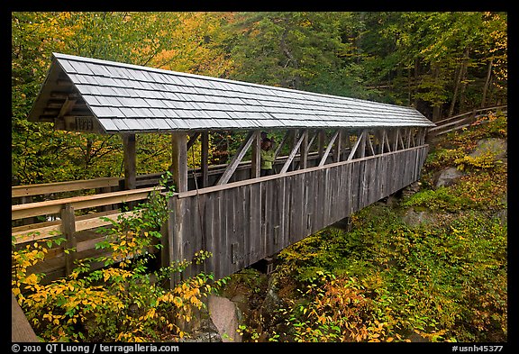 Wooden covered bridge in the fall, Franconia Notch State Park. New Hampshire, USA