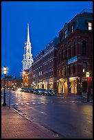 White-steepled Church and street with brick buildings by night. Portsmouth, New Hampshire, USA (color)