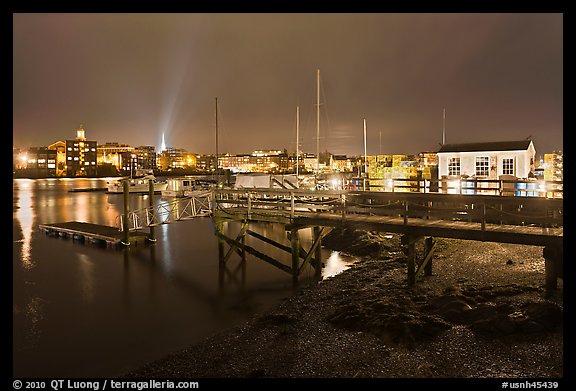 Pier and skyline by night. Portsmouth, New Hampshire, USA (color)