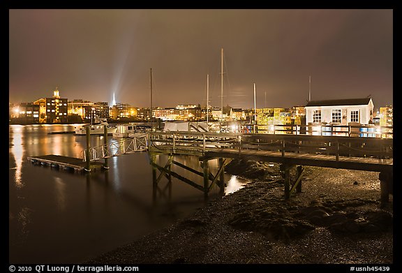 Pier and skyline by night. Portsmouth, New Hampshire, USA