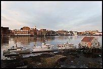 Boats, river, and skyline, early morning. Portsmouth, New Hampshire, USA