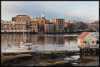 Fishing boat, shack, and waterfront buildings. Portsmouth, New Hampshire, USA (color)