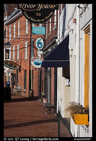 Sidewalk and waterfront buildings. Portsmouth, New Hampshire, USA