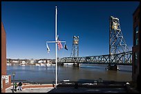 Riverside plaza, flagpole, and memorial bridge. Portsmouth, New Hampshire, USA