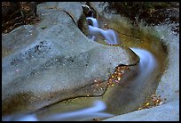 Water cascade over smooth rock, Franconia Notch State Park. New Hampshire, USA (color)