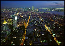 Streets at night from above with twin towers in background. USA ( color)