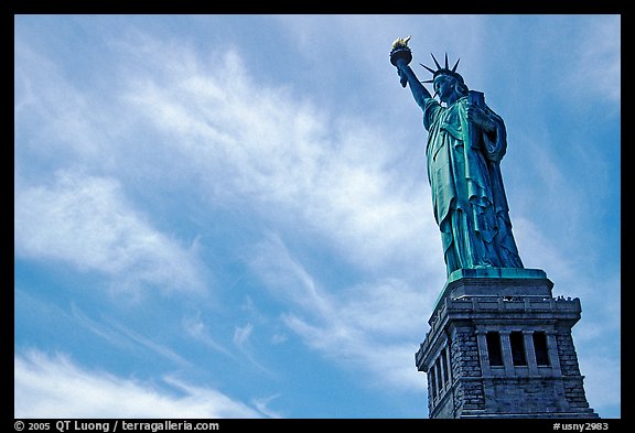 Statue of Liberty and pedestal against sky. NYC, New York, USA (color)