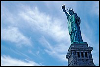 Statue of Liberty and pedestal against sky. NYC, New York, USA (color)