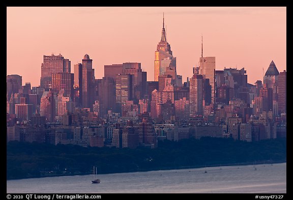New York skyline  with Empire State Building, sunrise. NYC, New York, USA (color)