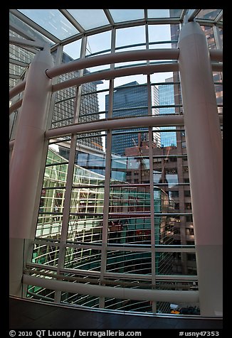 Looking through glass windows from One Beacon Court. NYC, New York, USA