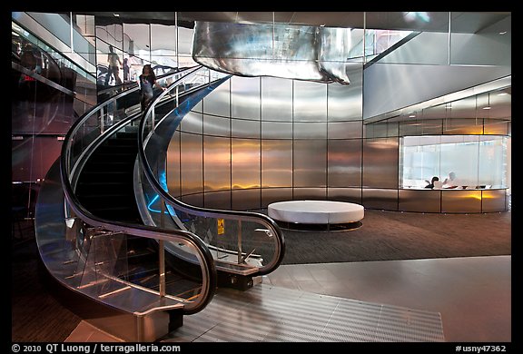 Curved moving staircase and meeeting room, Bloomberg building. NYC, New York, USA (color)