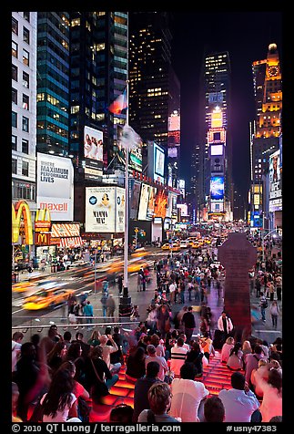 One Times Square at night and Francis Duffy monument. NYC, New York, USA (color)