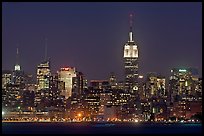 Mid-town Manhattan skyline by night. NYC, New York, USA (color)