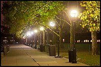 Row of lights by night, Ellis Island. NYC, New York, USA