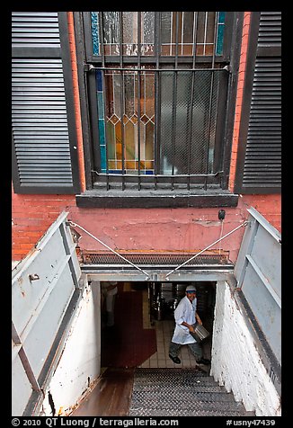 Restaurant basement seen from street. NYC, New York, USA (color)