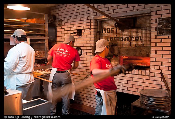 Pizza preparation, Lombardi pizzeria kitchen. NYC, New York, USA