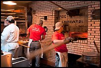 Pizza preparation, Lombardi pizzeria kitchen. NYC, New York, USA