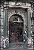 Door of old building on Bowery. NYC, New York, USA (color)