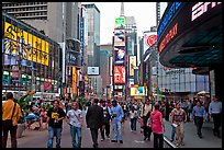 Crowds on Times Squares by day. NYC, New York, USA