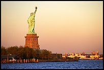 Statue of Liberty and Liberty Island from the back, sunset. NYC, New York, USA (color)