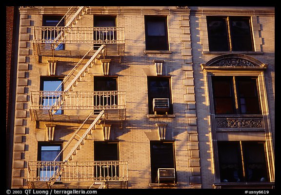 Residential building with emergency exit staircases. NYC, New York, USA (color)