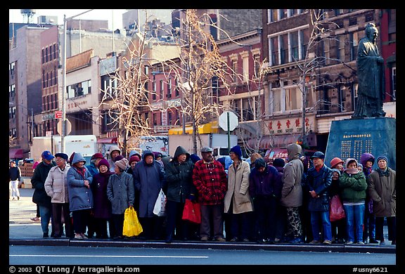 Gathering in Chinatown in winter. NYC, New York, USA