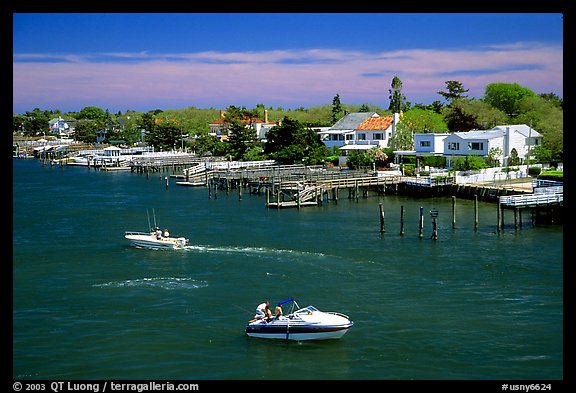 Canal and houses in Long Beach. New York, USA (color)