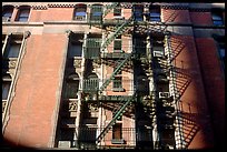 Emergency exit staircases on the side of a building. NYC, New York, USA