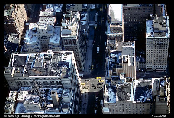 Canyon-like streets and yellow cabs seen from the Empire State building. NYC, New York, USA