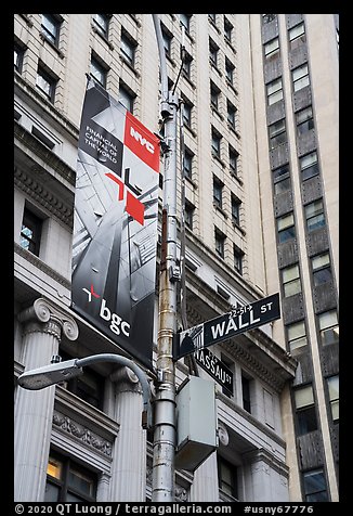 Street signs at the intersection of Wall Street and Nassau Street. NYC, New York, USA (color)