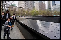 Jewish family walks by 9/11 Memorial. NYC, New York, USA ( color)