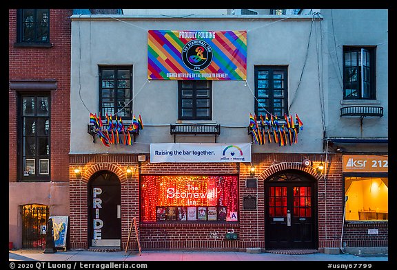Stonewall Inn building facade with gay pride flags. NYC, New York, USA (color)