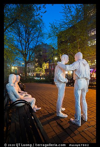Gay Liberation sculpture by George Segal at night, Stonewall National Monument. NYC, New York, USA (color)
