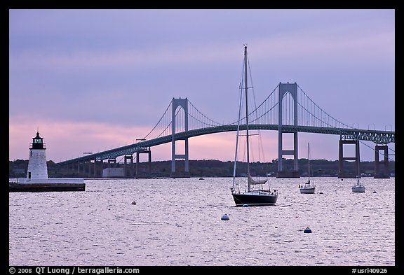 Newport Bridge and Newport Harbor lighthouse at sunset. Newport, Rhode Island, USA (color)