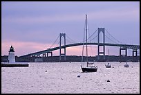 Newport Bridge and Newport Harbor lighthouse at sunset. Newport, Rhode Island, USA ( color)