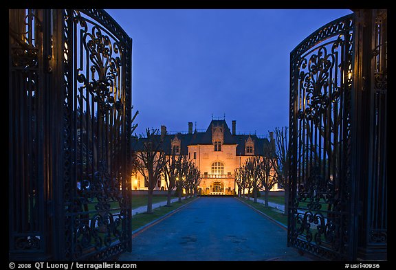 Entrance gate and historic mansion building at night. Newport, Rhode Island, USA (color)