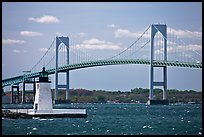Newport Harbor lighthouse, Newport Bridge, and Narragansett Bay. Newport, Rhode Island, USA