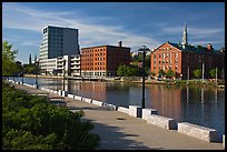 Brick buildings reflected in Seekonk river, late afternoon. Providence, Rhode Island, USA