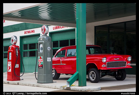 Vintage gas pumps and car, Deadwood. Black Hills, South Dakota, USA (color)