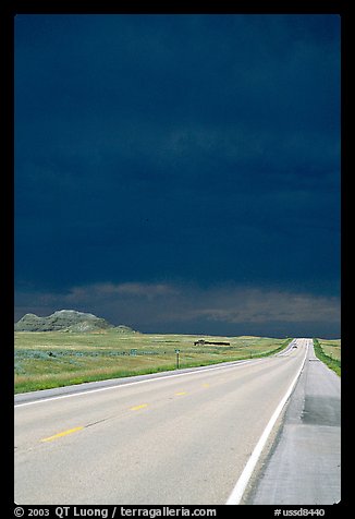 Storm cloud over road. South Dakota, USA (color)