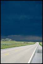 Storm cloud over road. South Dakota, USA (color)