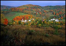 Village of East Corinth surrounded by fall colors, early morning. Vermont, New England, USA