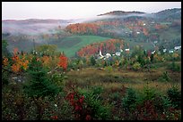 East Corinth village in fall with morning fog. Vermont, New England, USA