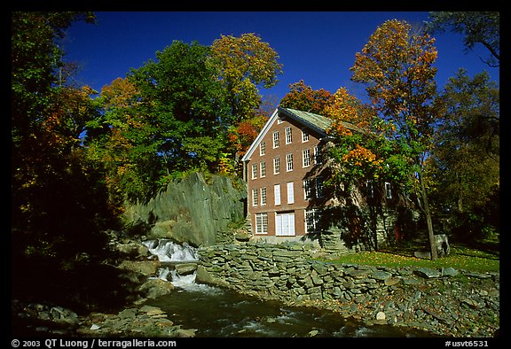 Old Mill next to a cascading brook near Stowe. Vermont, New England, USA