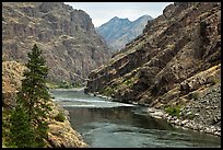 High cliffs above free-flowing part of Snake River. Hells Canyon National Recreation Area, Idaho and Oregon, USA (color)